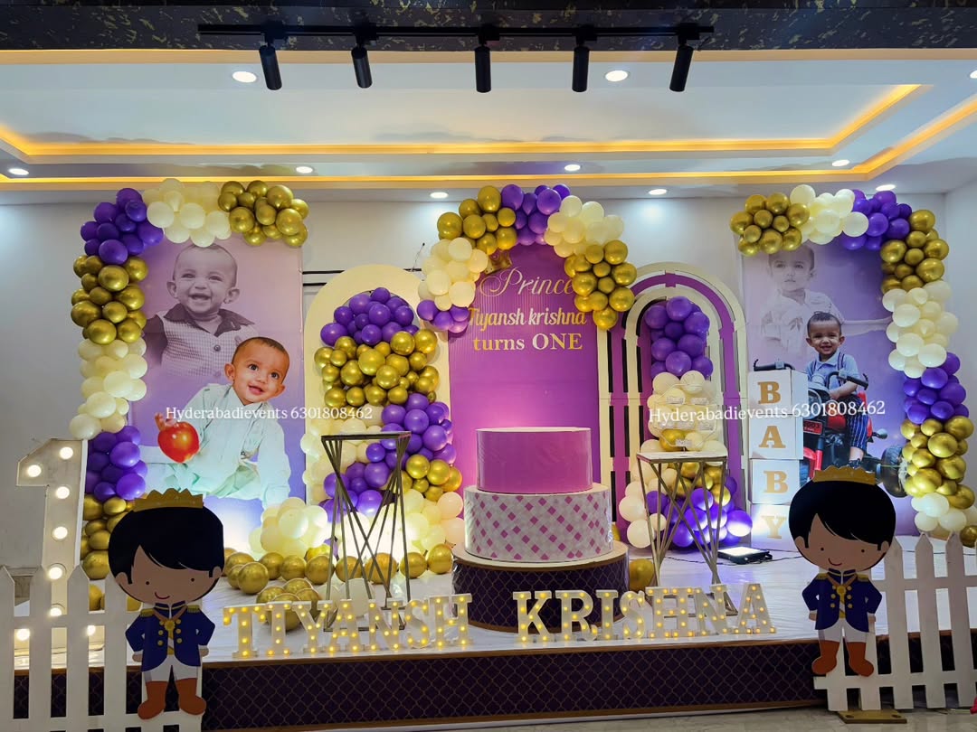 Grand 20ft birthday stage decoration with balloon arches, LED name letters and customized backdrop in Hyderabad.