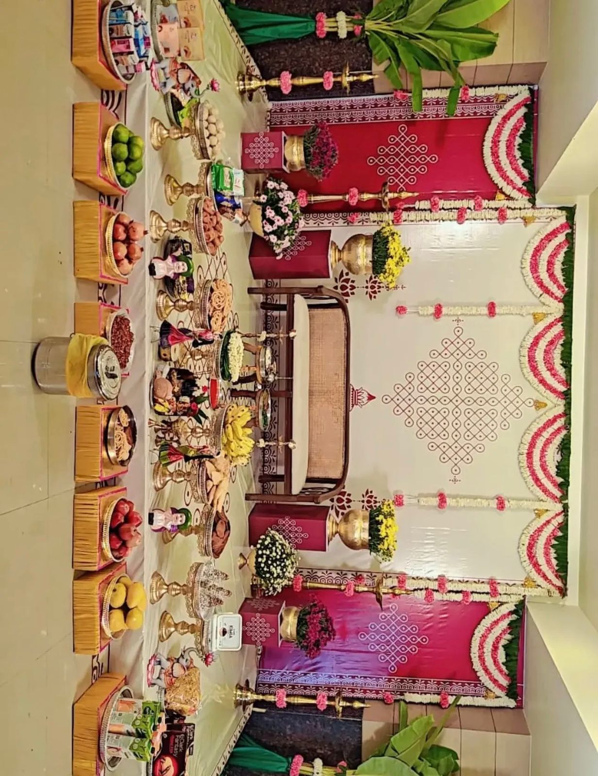 Traditional Valaikappu decoration with flower garlands, seating arrangement and ceremony setup