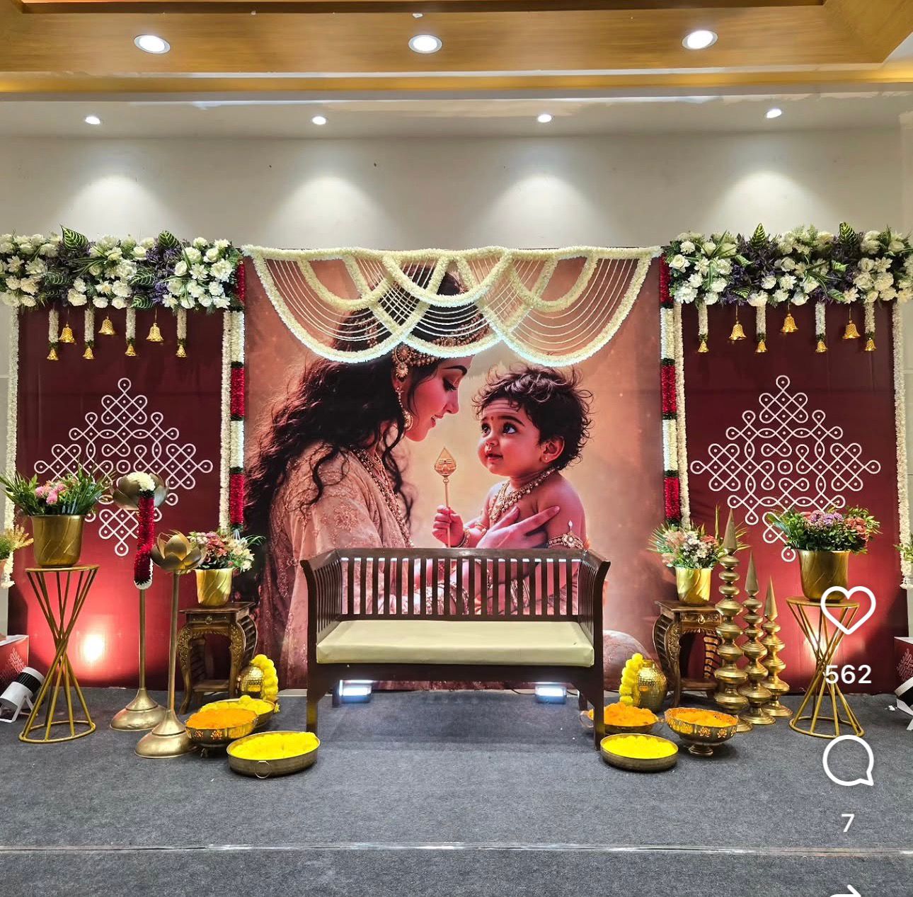 Mother and baby themed cradle ceremony decoration with premium floral backdrop, cradle, traditional décor and elegant lighting in Hyderabad.