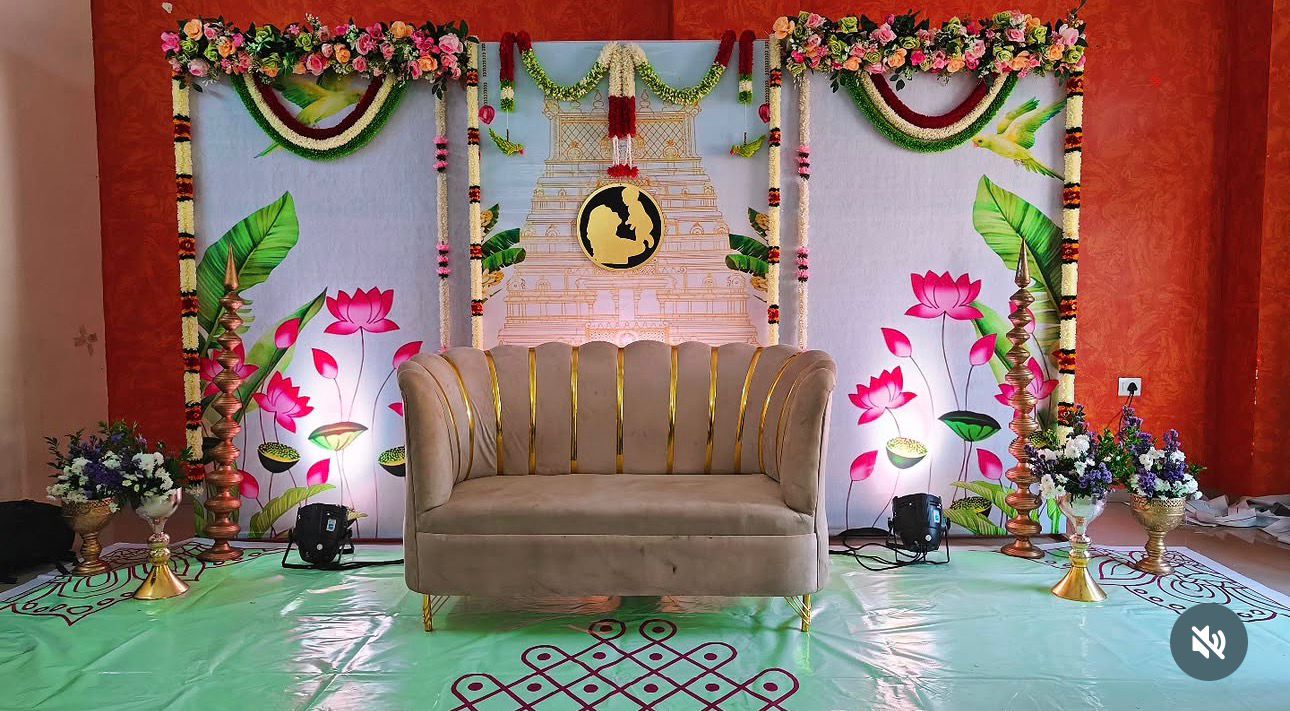 Elegant lotus temple theme Seemantham decoration with lotus artwork, floral garlands, banana leaves and luxury sofa in Hyderabad.
